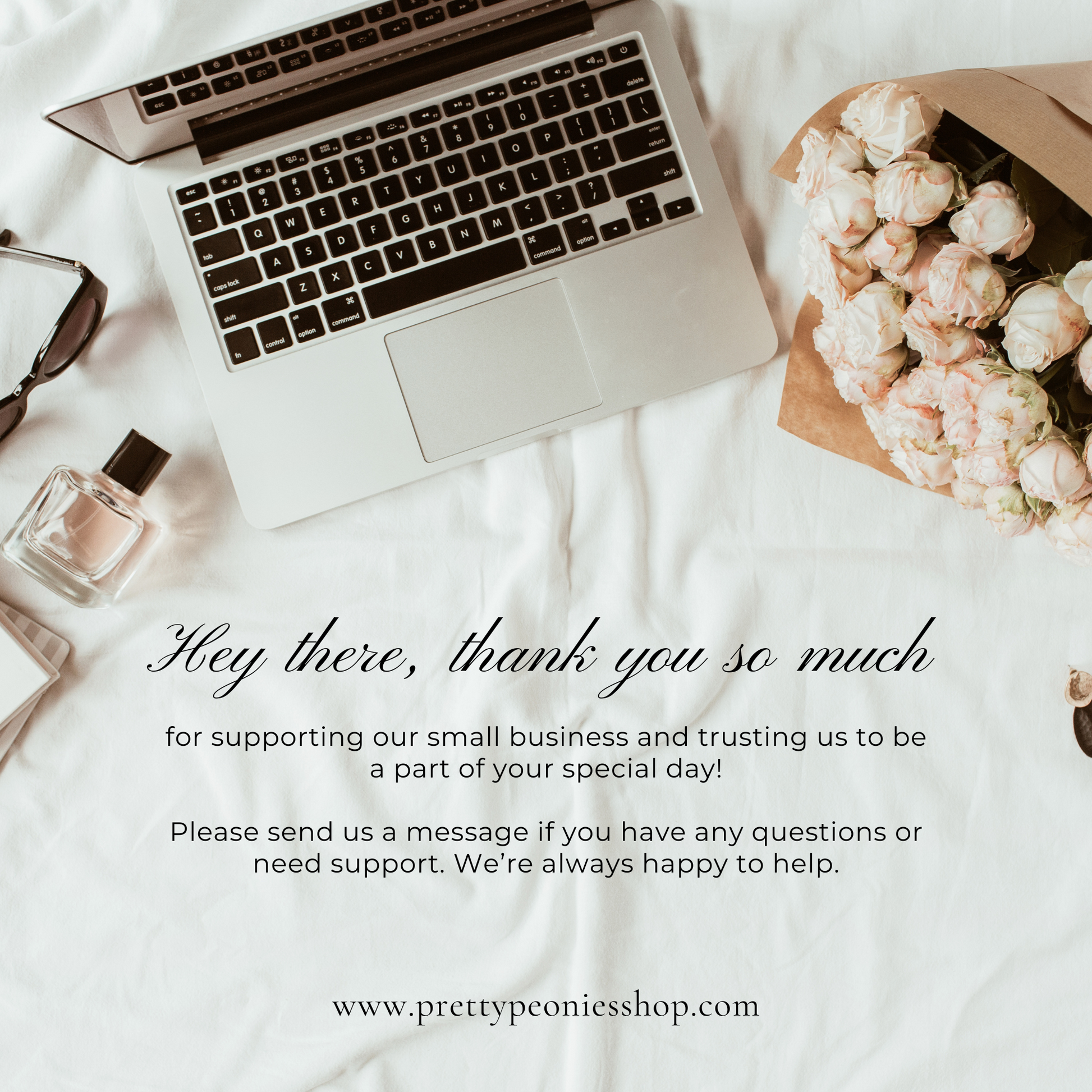 Laptop on a white surface with flowers and perfume bottle, promotional message overlay.