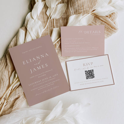 Wedding invitation set with RSVP card on a soft fabric background
