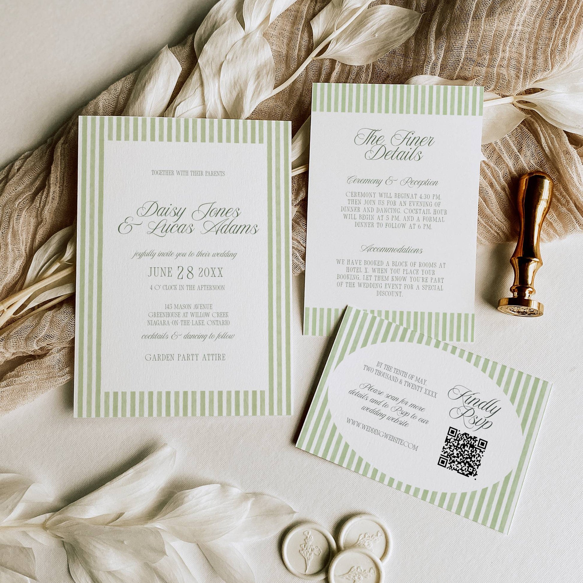 Wedding invitation set with green and white design on a neutral background