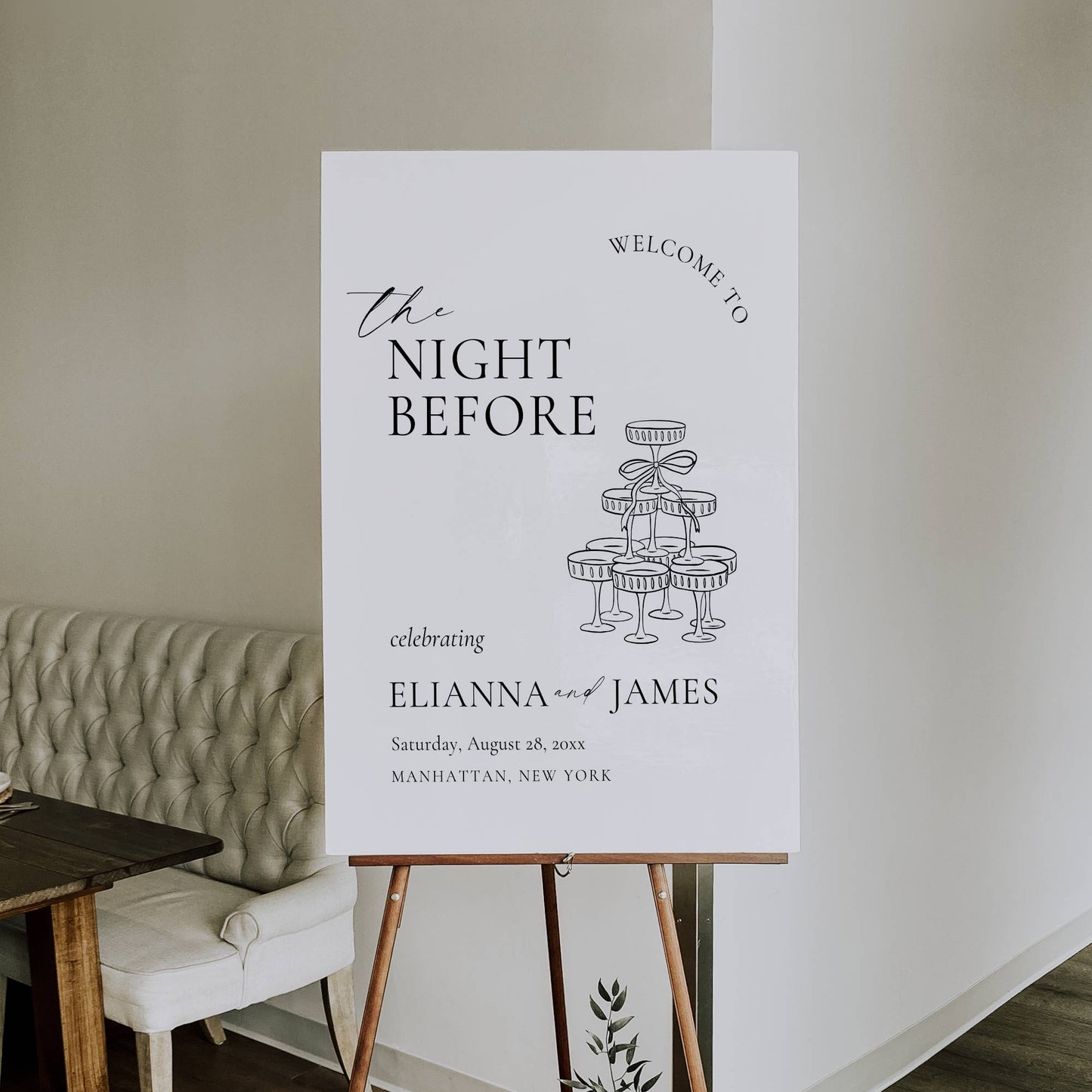Wedding welcome sign on an easel with decorative elements in a room.