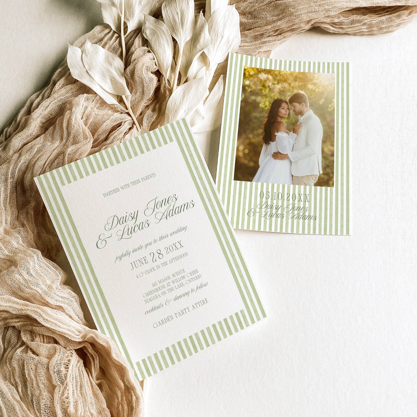 Wedding invitation card with a couple photo on a textured surface