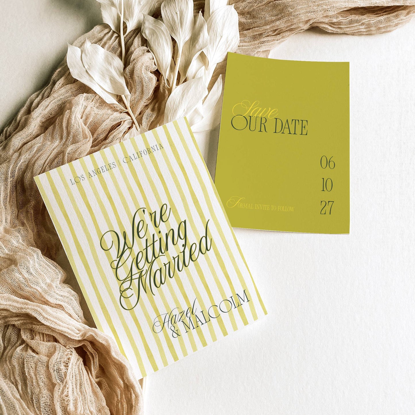 Wedding invitation cards with 'We're Getting Married' and 'Save the Date' text on a light background.
