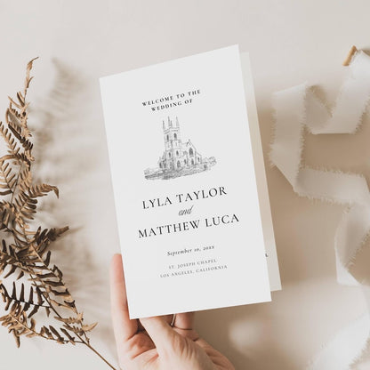 Folded Catholic wedding program with a church sketch illustration