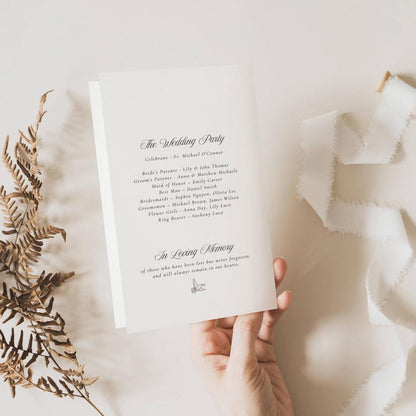 Folded wedding program open to the wedding party and in loving memory sections