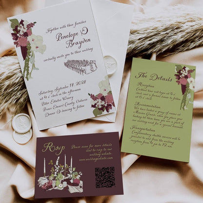 Burgundy olive wedding invitation suite styled on a satin fabric background