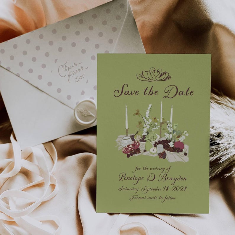 Sage green Save the Date paired with a floral wax-sealed envelope and swan illustration