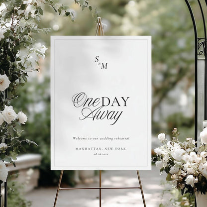 Black and white Old Money rehearsal welcome sign displayed on a gold metal easel