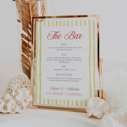 Island Citrus bar menu sign in gold frame listing spirits wine beer signature drinks