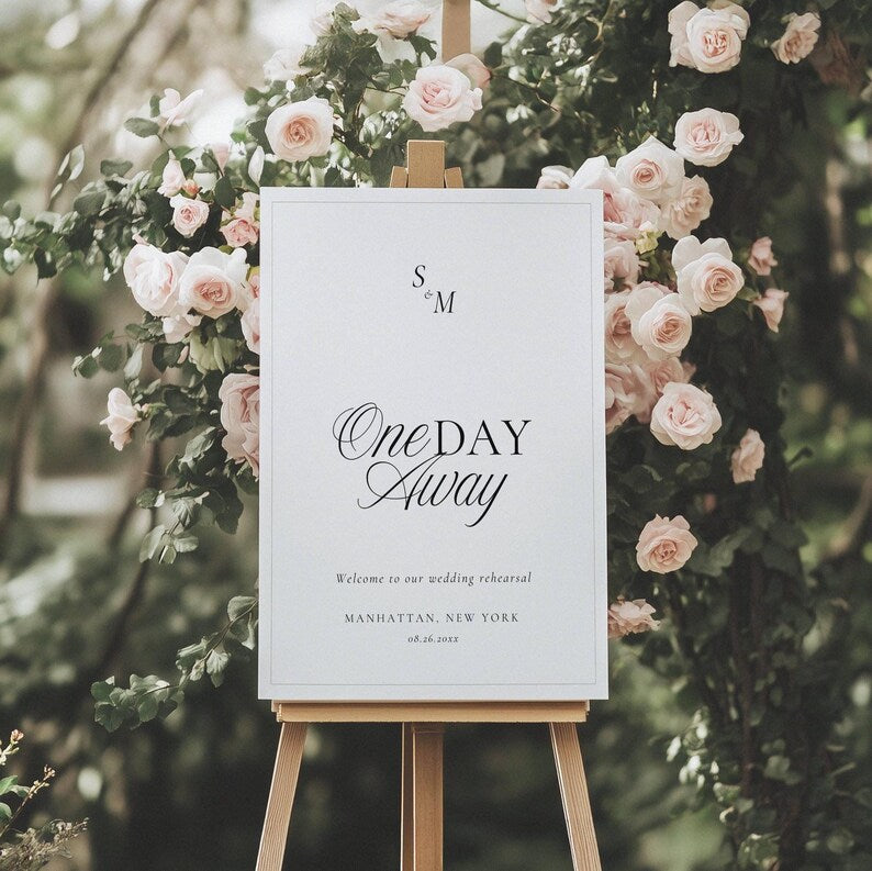 Black and white Old Money rehearsal welcome sign displayed on a wooden easel with thin border