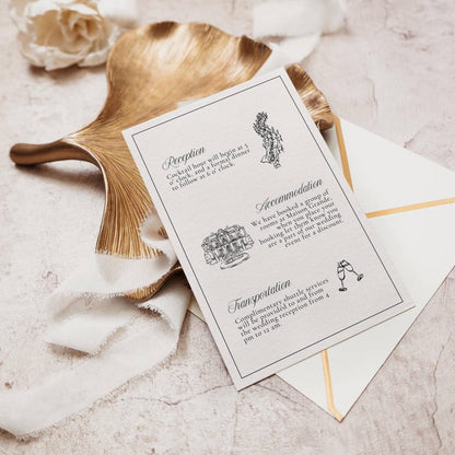 Black and white wedding invitation with reception and accommodation details on gold leaf dish