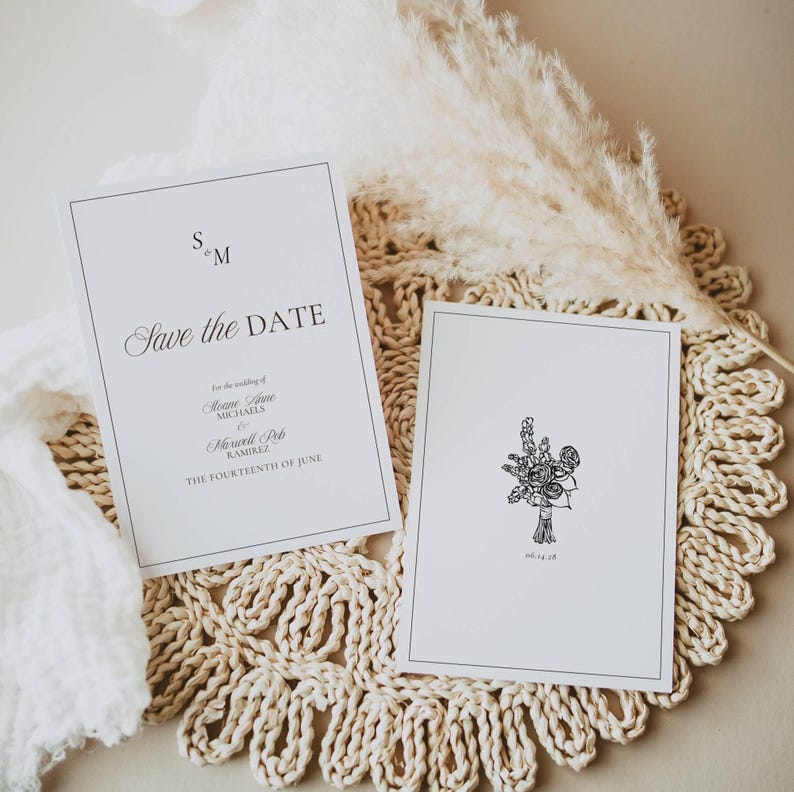 Black and white save the date suite with monogram card and floral bouquet line art card
