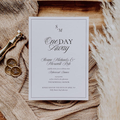 Black and white Old Money rehearsal invitation styled with monogram and script