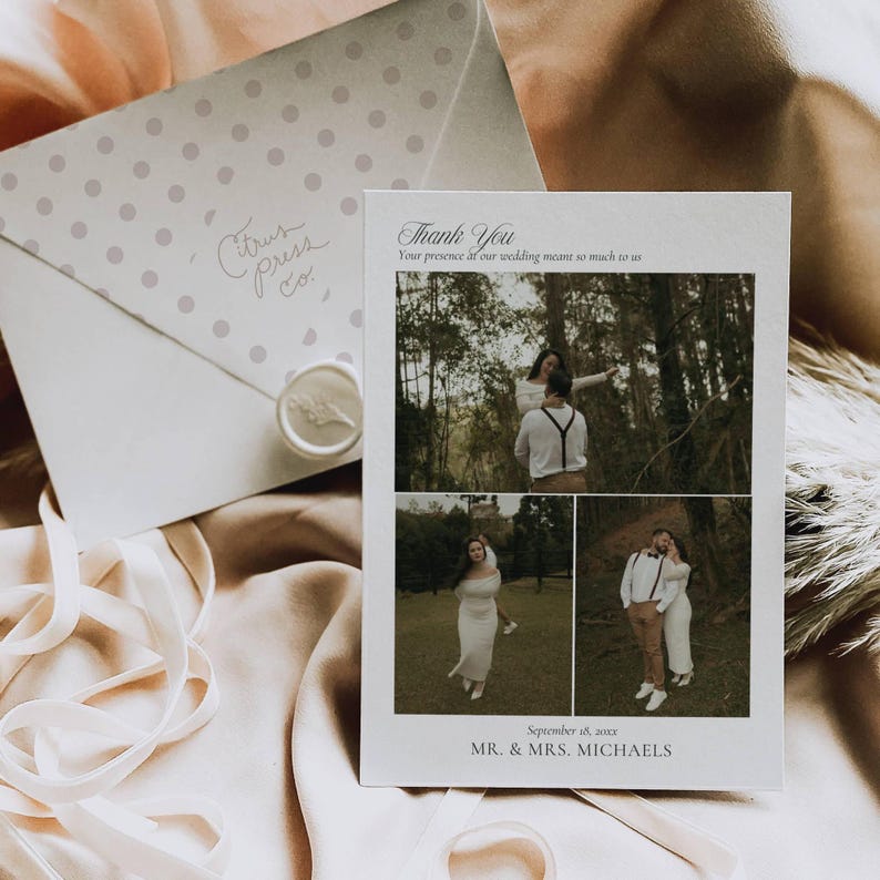 Black and white wedding photo thank you card with wax seal envelope, ribbon, and photo collage of the couple, styled flat lay