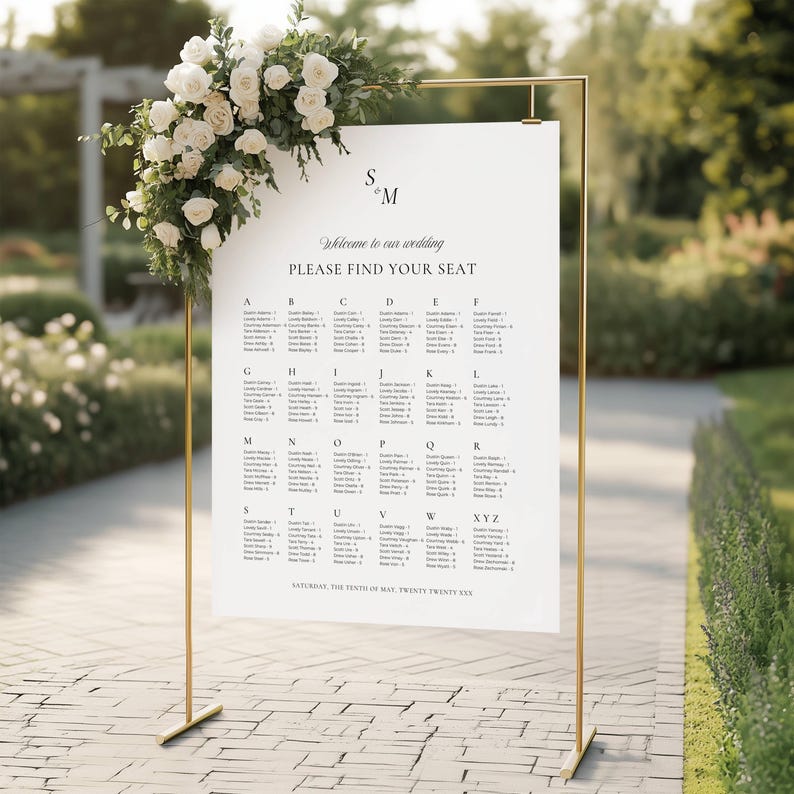 Minimalist black and white alphabetical seating chart template shown flat on a cream easel display