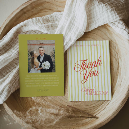 Two wedding thank you cards, one olive green with photo, one yellow striped with Thank You text