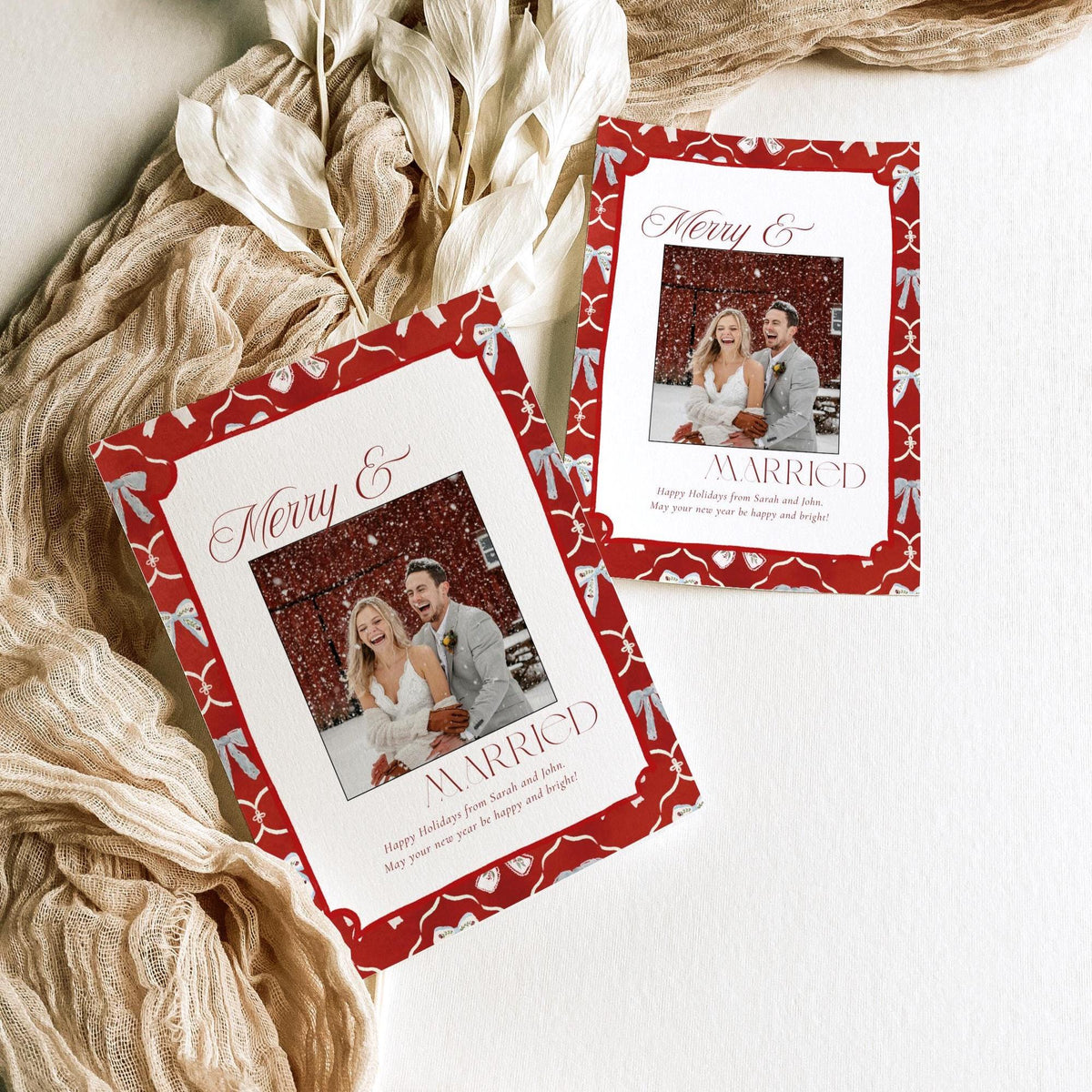 First Christmas married photo card with red and blue bow border, styled with holiday details