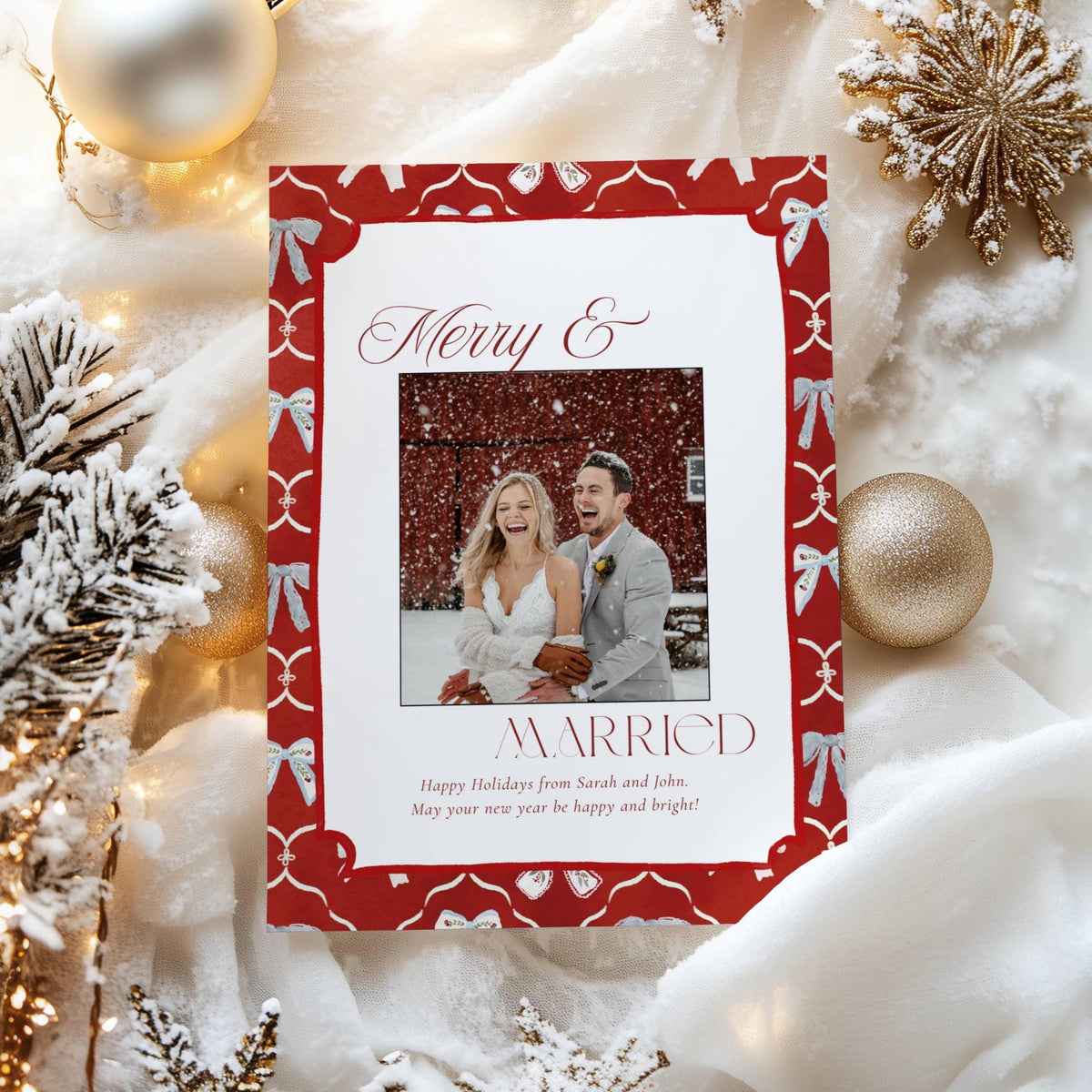 Red Merry and Married newlywed Christmas photo card with a hand-painted blue bow border, 5x7 Canva template