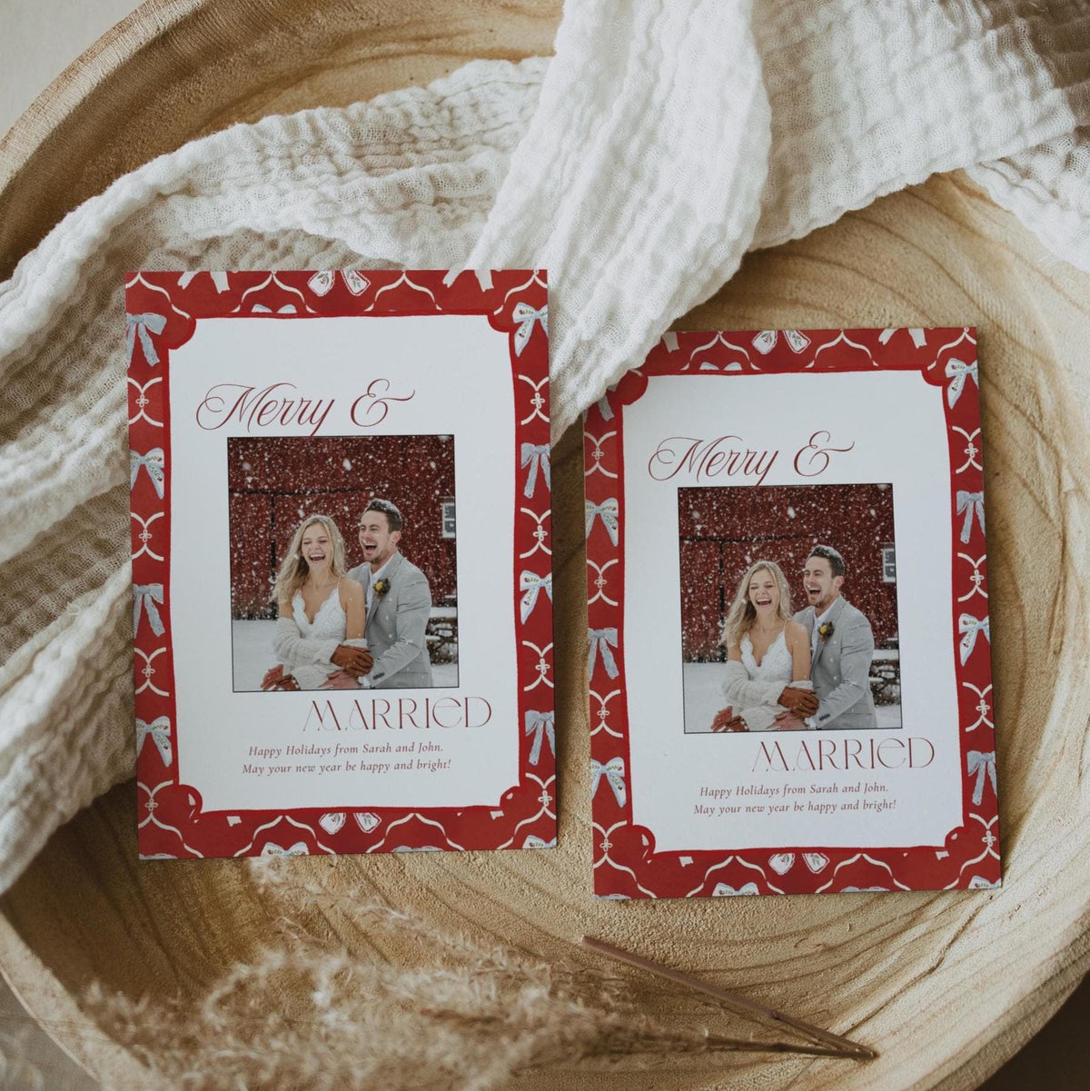 Red bow Merry and Married newlywed Christmas card template with your wedding photo and holiday greeting