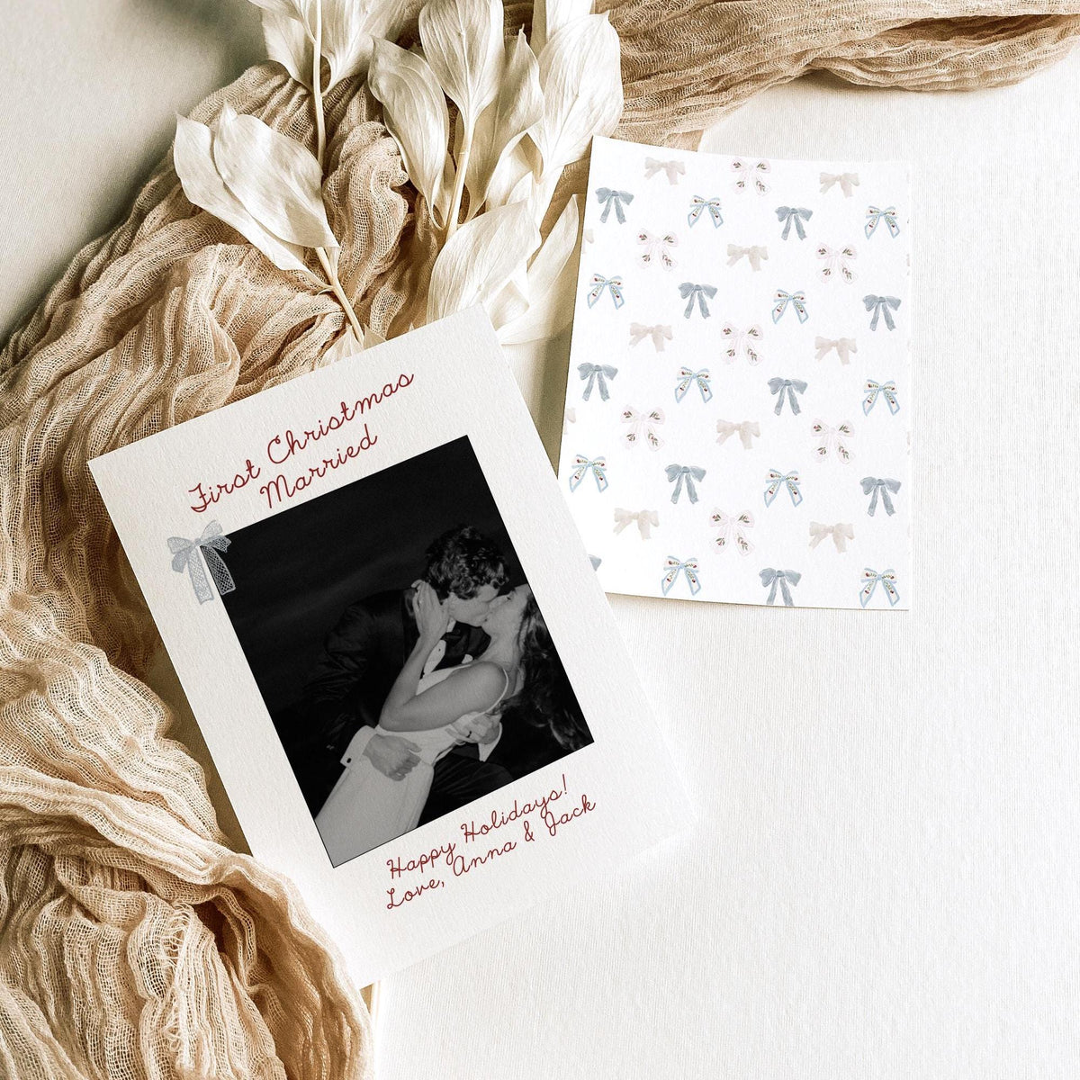 First Christmas Married newlywed photo card with festive blue bows and handwritten script, 5x7 Canva template
