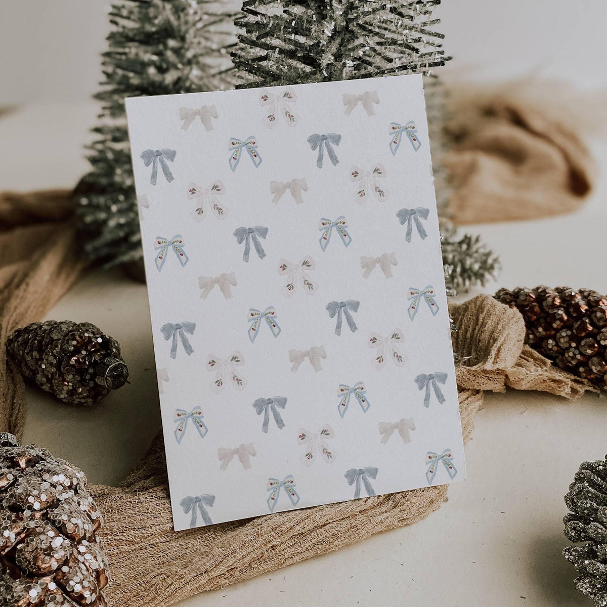 Blue bow newlywed Christmas photo card for your first holiday season as a married couple