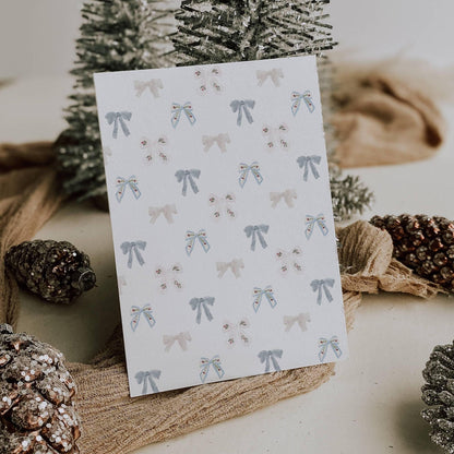 Blue bow newlywed Christmas photo card for your first holiday season as a married couple